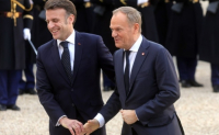 Γαλλοπολωνικό σύμφωνο φιλίας και σύμπραξης υπογράφουν Εμ. Μακρόν και Ντ. Τουσκ