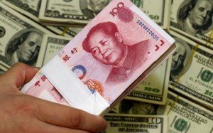 Σε ιστορικό χαμηλό το γουάν για τις συναλλαγές εκτός Κίνας έναντι του δολαρίου