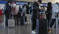 Κίνα-Covid-19: Αίρεται η καραντίνα για τους ξένους ταξιδιώτες