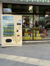 Achaean Land: Ελαιόλαδο με το πάτημα ενός κουμπιού από αυτόματους πωλητές