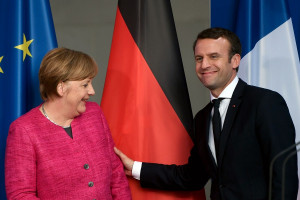 Ο Μακρόν ζητά ενίσχυση των εξουσιών του ΠΟΥ, η Μέρκελ στηρίζει το αίτημα για συνθήκη αποτροπής πανδημιών